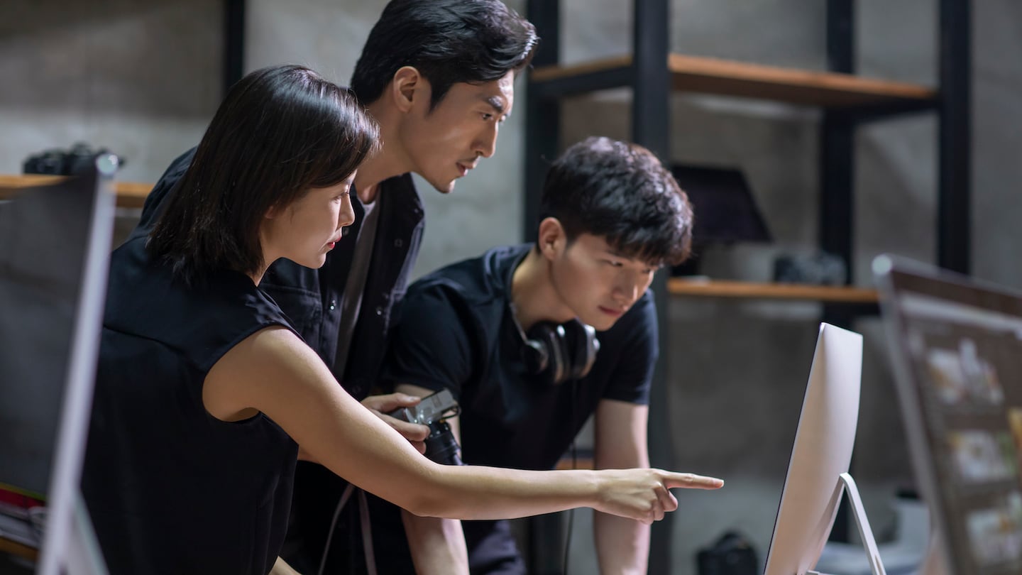 Photographers reviewing imagery, BoF Careers 2022. Getty Images.