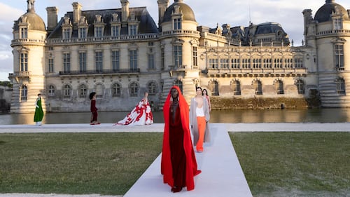 At Couture, a Château, a Diamond Necklace and a Bouquet of Red Roses